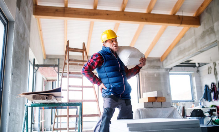 SHOPFITTER-SUFFERS-SERIOUS-NECK-BACK-INJURY-LIFTING-AT-WORK