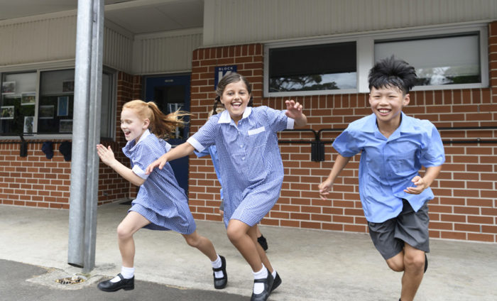 school boy falls into drain in the schoolyard